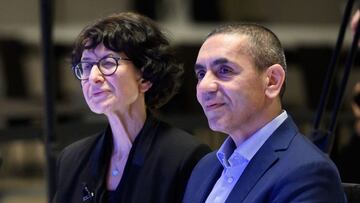 Scientists, CEO and founders of BioNTech, Ozlem Tureci and Ugur Sahin listens to a laudatio during an internet broadcasted ceremony of the Axel Springer Awards, in Berlin, on March 18, 2021. - The award winners are honored "for their entrepreneurial spirit, innovative strength and sense of social responsibility". (Photo by Bernd von Jutrczenka / POOL / AFP)