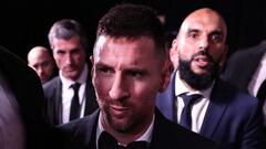 Inter Miami CF's Argentine forward Lionel Messi (C) reacts as he leaves the 2023 Ballon d'Or France Football award ceremony at the Theatre du Chatelet in Paris on October 30, 2023. Lionel Messi won the men's Ballon d'Or award for a record-extending eight time at a ceremony in Paris on October 30, 2023. (Photo by FRANCK FIFE / AFP)