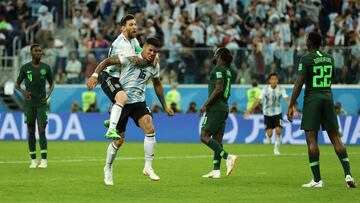 SAINT PETERSBURG, RUSSIA - JUNE 26: Marcos Rojo of Argentina celebrates after scoring his team's second goal with teammate Lionel Messi during the 2018 FIFA World Cup Russia group D match between Nigeria and Argentina at Saint Petersburg Stadium on