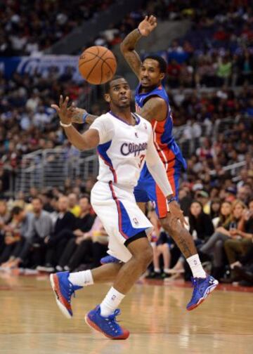 Chris Paul y Brandon Jennings.