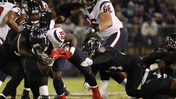 Running Back Alfred Blue #28 of the Houston Texans carries the ball.