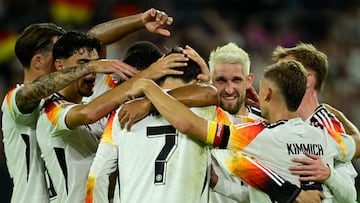 Germany's midfielder #07 Kai Havertz (C) celebrates with teammates after scoring the 5-0 penalty goal during the League A Group A3 football match of the UEFA Nations League between Germany and Hungary in in Duesseldorf, western Germany, on September 7, 2024. (Photo by John MACDOUGALL / AFP)