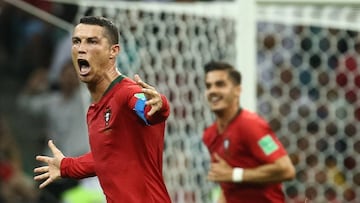FWC04-23. Sochi (Russian Federation), 15/06/2018.- Cristiano Ronaldo of Portugal celebrates after scoring his third goal against Spain during the FIFA World Cup 2018 group A preliminary round soccer match between Portugal and Spain at the Fisht Stadium, in Sochi, Russia, 15 June 2018.
(RESTRICTIONS APPLY: Editorial Use Only, not used in association with any commercial entity - Images must not be used in any form of alert service or push service of any kind including via mobile alert services, downloads to mobile devices or MMS messaging - Images must appear as still images and must not emulate match action video footage - No alteration is made to, and no text or image is superimposed over, any published image which: (a) intentionally obscures or removes a sponsor identification image; or (b) adds or overlays the commercial identification of any third party which is not officially associated with the FIFA World Cup) (España, Mundial de Fútbol, Rusia) EFE/EPA/PAULO NOVAIS EDITORIAL USE ONLY