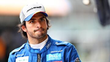 NORTHAMPTON, ENGLAND - JULY 13: Carlos Sainz of Spain and McLaren F1 walks in the Pitlane during qualifying for the F1 Grand Prix of Great Britain at Silverstone on July 13, 2019 in Northampton, England. (Photo by Mark Thompson/Getty Images)