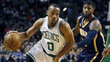 Boston Celtics&#039; Avery Bradley (0) drives past Indiana Pacers&#039; Paul George during the second quarter of an NBA basketball game in Boston, Wednesday, March 22, 2017. The Celtics won 109-100. (AP Photo/Michael Dwyer)