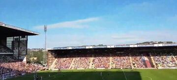 The match is halted as the drone flies overhead (out of shot)