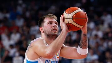 Basketball - FIBA World Cup 2023 - First Round - Group F - Slovenia v Venezuela - Okinawa Arena, Okinawa, Japan - August 26, 2023 Slovenia's Luka Doncic scores a free throw REUTERS/Issei Kato