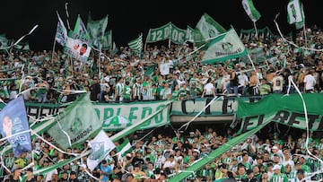 Fans of Nacional cheer for their team during the Colombian League second leg football final match between Atletico Nacional and Deportes Tolima at the Atanasio Girardot Stadium in Medellin, Colombia on December 22, 2024. (Photo by JAIME SALDARRIAGA / AFP)