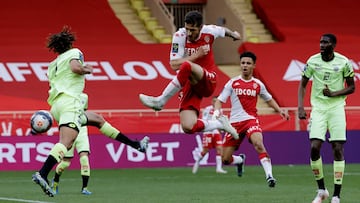 Soccer Football - Ligue 1 - AS Monaco v Dijon - Stade Louis II, Monaco - April 11, 2021 AS Monaco&#039;s Stevan Jovetic in action with Dijon&#039;s Sacha Boey REUTERS/Eric Gaillard