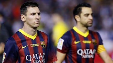 Xavi hernández y Leo Messi, durante un partido del Barcelona.
