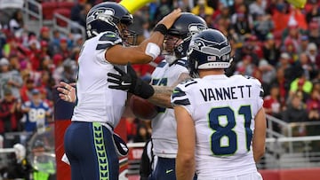 SANTA CLARA, CA - NOVEMBER 26: Russell Wilson #3, Justin Britt #68 and Nick Vannett #81 of the Seattle Seahawks celebrates after Wilson scored on a 2-yard touchdown run against the San Francisco 49ers during their NFL football game at Levi&#039;s Stadium on November 26, 2017 in Santa Clara, California.   Thearon W. Henderson/Getty Images/AFP
 == FOR NEWSPAPERS, INTERNET, TELCOS &amp; TELEVISION USE ONLY ==