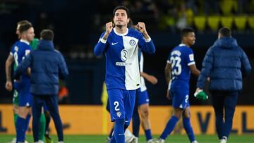 Atletico Madrid's Uruguayan defender #02 Jose Gimenez celebrates at the end of the Spanish League football match between Villarreal CF and Club Atletico de Madrid at La Ceramica stadium in Vila-real, on April 1, 2024. (Photo by JOSE JORDAN / AFP)