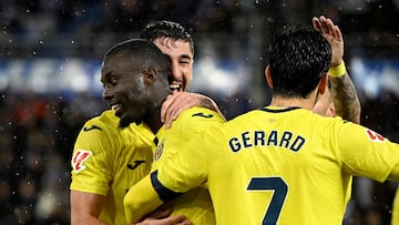 Villarreal's Ivorian forward #19 Nicolas Pepe (C) celebrates scoring an equalizing goal during the Spanish League football match between Deportivo Alaves and Villarreal CF at Mendizorroza Stadium in Vitoria on March 13, 2026. (Photo by ANDER GILLENEA / AFP)