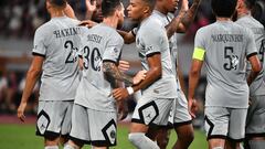 Paris Saint-Germain's Argentinian forward Lionel Messi (C) celebrates his goal with French forward Kylian Mbappe (C) during PSG's Japan Tour football match against Kawasaki Frontale at the National Stadium in Tokyo on July 20, 2022. (Photo by Kazuhiro NOGI / AFP)