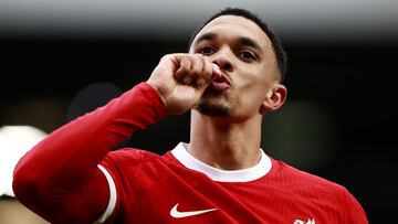 Liverpool's English defender #66 Trent Alexander-Arnold celebrates scoring the opening goal during the English Premier League football match between Fulham and Liverpool at Craven Cottage in London on April 21, 2024. (Photo by BENJAMIN CREMEL / AFP) / RESTRICTED TO EDITORIAL USE. No use with unauthorized audio, video, data, fixture lists, club/league logos or 'live' services. Online in-match use limited to 120 images. An additional 40 images may be used in extra time. No video emulation. Social media in-match use limited to 120 images. An additional 40 images may be used in extra time. No use in betting publications, games or single club/league/player publications. / 