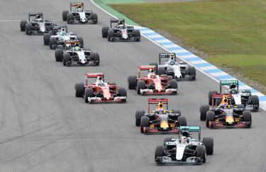 Hamilton coasts to victory to widen gap over Rosberg