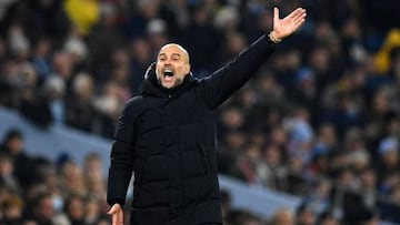 Manchester City's Spanish manager Pep Guardiola shouts during the English League Cup fourth round football match between Manchester City and Liverpool, at the Etihad stadium in Manchester on December 22, 2022. - - RESTRICTED TO EDITORIAL USE. No use with unauthorized audio, video, data, fixture lists, club/league logos or 'live' services. Online in-match use limited to 120 images. An additional 40 images may be used in extra time. No video emulation. Social media in-match use limited to 120 images. An additional 40 images may be used in extra time. No use in betting publications, games or single club/league/player publications. (Photo by Oli SCARFF / AFP) / RESTRICTED TO EDITORIAL USE. No use with unauthorized audio, video, data, fixture lists, club/league logos or 'live' services. Online in-match use limited to 120 images. An additional 40 images may be used in extra time. No video emulation. Social media in-match use limited to 120 images. An additional 40 images may be used in extra time. No use in betting publications, games or single club/league/player publications. / RESTRICTED TO EDITORIAL USE. No use with unauthorized audio, video, data, fixture lists, club/league logos or 'live' services. Online in-match use limited to 120 images. An additional 40 images may be used in extra time. No video emulation. Social media in-match use limited to 120 images. An additional 40 images may be used in extra time. No use in betting publications, games or single club/league/player publications. (Photo by OLI SCARFF/AFP via Getty Images)