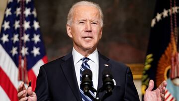 U.S. President Joe Biden delivers remarks on tackling climate change prior to signing executive actions in the State Dining Room at the White House in Washington, U.S., January 27, 2021. REUTERS/Kevin Lamarque