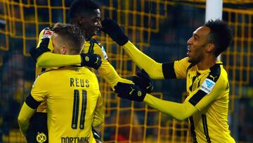 Football Soccer - Borussia Dortmund v Borussia Moenchengladbach - German Bundesliga - Signal Iduna Park, Dortmund, Germany - 3/12/16 - Borussia Dortmund's Ousmane Dembele celebrates with his teammates Marco Reus and Pierre-Emerick Aubameyang after scoring a goal. REUTERS/Thilo Schmuelgen DFL RULES TO LIMIT THE ONLINE USAGE DURING MATCH TIME TO 15 PICTURES PER GAME. IMAGE SEQUENCES TO SIMULATE VIDEO IS NOT ALLOWED AT ANY TIME. FOR FURTHER QUERIES PLEASE CONTACT DFL DIRECTLY AT + 49 69 650050.