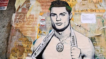 A detail of a new mural by Italian street artist TvBoy, entitled &quot;Il Segreto di Cristiano&quot; (Cristiano&#039;s Secret) showing Portuguese footballer Cristiano Ronaldo in rainbow striped boxer underwear, is pictured on November 19, 2018 in downtown