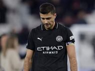 Manchester City's Spanish midfielder #16 Rodri reacts on the pitch after the English Premier League football match between West Ham United and Manchester City at the London Stadium, in east London on March 14, 2026. The game finished 1-1. (Photo by Ian Kington / AFP) / RESTRICTED TO EDITORIAL USE. No use with unauthorized audio, video, data, fixture lists, club/league logos or 'live' services. Online in-match use limited to 120 images. An additional 40 images may be used in extra time. No video emulation. Social media in-match use limited to 120 images. An additional 40 images may be used in extra time. No use in betting publications, games or single club/league/player publications. /