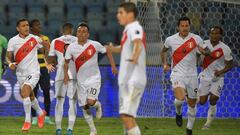 Peru&#039;s Gianluca Lapadula (2nd R) celebrates after scoring against Ecuador during their Conmebol Copa America 2021 football tournament group phase match at the Olympic Stadium in Goiania, Brazil, on June 23, 2021. (Photo by NELSON ALMEIDA / AFP)