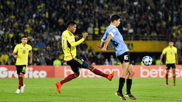 Colombia's Andres Caraballo and Uruguay's Facu Gonzalez during the 2023 CONMEBOL U-20 championship between Colombia and Uruguay, in Bogota, Colombia on January 31, 2022. (Photo by Sebastian Barros/NurPhoto via Getty Images)