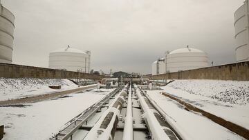 Snow covered transfer lines leading to storage tanks at the Dominion Cove Point Liquefied Natural Gas (LNG) terminal in Lusby, Maryland.