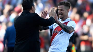 River Plate's Bruno Zuculini (R) celebrates with Marcelo Gallardo (L) after scoring against Spain's Real Betis during a friendly football match at the Malvinas Argentinas stadium in Mendoza, Argentina, on November 13, 2022. (Photo by Andres Larrovere / AFP) (Photo by ANDRES LARROVERE/AFP via Getty Images)