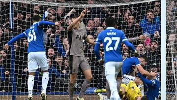 Everton's English defender #32 Jarrad Branthwaite scores his team's second goal during the English Premier League football match between Everton and Tottenham Hotspur at Goodison Park in Liverpool, northwest England, on February 3, 2024. (Photo by Paul ELLIS / AFP) / RESTRICTED TO EDITORIAL USE. No use with unauthorized audio, video, data, fixture lists, club/league logos or 'live' services. Online in-match use limited to 120 images. An additional 40 images may be used in extra time. No video emulation. Social media in-match use limited to 120 images. An additional 40 images may be used in extra time. No use in betting publications, games or single club/league/player publications. /
