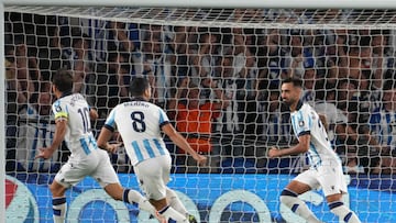 Real Sociedad's Spanish midfielder #23 Brais Mendez (R) celebrates scoring the opening goal during the UEFA Champions League 1st round day 1 group D football match between Real Sociedad and Inter Milan at the Reale Arena stadium in San Sebastian on September 20, 2023. (Photo by CESAR MANSO / AFP)