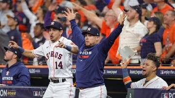 HOUSTON, TEXAS - OCTOBER 19: Christian Vazquez #9 and Mauricio Dubon #14 of the Houston Astros react to a home run hit by Chas McCormick #20 in game one of the American League Championship Series against the New York Yankees at Minute Maid Park on October 19, 2022 in Houston, Texas. Carmen Mandato/Getty Images/AFP
