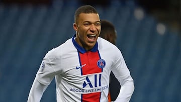 Paris Saint-Germain&#039;s French forward Kylian Mbappe (L) celebrates after scoring a goal during the French L1 football match between Montpellier Herault (MHSC) and Paris Saint Germain (PSG) at the Mosson Stadium in Montpellier, southern France, on Dece