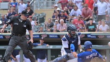 With the controversial reversal in the Blue Jays win over the Twins in extra innings, we take a hard look at the Buster Posey rule and how it is applied