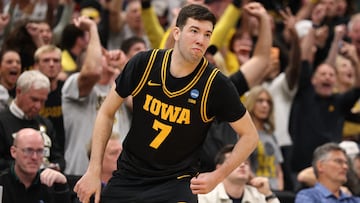 Mar 22, 2026; Tampa, FL, USA; Iowa Hawkeyes forward Alvaro Folgueiras (7) makes a go-ahead three-point basket against the Florida Gators late in the second half during a second round game of the men's 2026 NCAA Tournament at Benchmark International Arena. Mandatory Credit: Nathan Ray Seebeck-Imagn Images