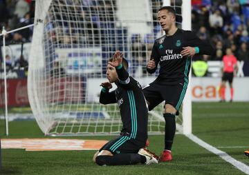 Sergio Ramos celebrates scoring their third goal from the penalty spot.