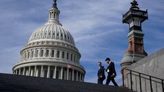 People walk past the U.S. Capitol building in Washington, U.S., November 15, 2023. REUTERS/Elizabeth Frantz