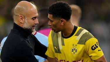 Guardiola con Bellingham, en un encuentro entre el City y el Dortmund.