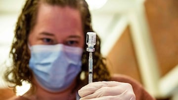 A medical worker prepares the Pfizer-BioNTech Covid-19 vaccine booster to be given to children 12-15 years old at Hartford Hospital in Hartford, Connecticut.