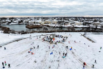 Thanksgiving has brought snow to parts of New York, making travel "difficult to impossible"