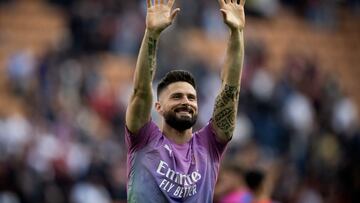 (FILES) AC Milan's French forward #09 Olivier Giroud waves to fans after winning 3-0 the Italian Serie A football match between AC Milan and Lecce at San Siro Stadium, in Milan on April 6, 2024. Olivier Giroud's arrival at Los Angeles FC is a coup for the club both on and off the pitch, officials said May 14, 2024 after officially announcing the veteran French striker's arrival in Major League Soccer. (Photo by GABRIEL BOUYS / AFP)