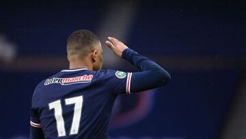 Paris Saint-Germain's French forward Kylian Mbappe reacts after scoring a penalty kick during the French Cup round of 16 football match between Paris Saint-Germain (PSG) and Lille (LOSC) at the Parc des Princes stadium in Paris, on March 17, 2021. (