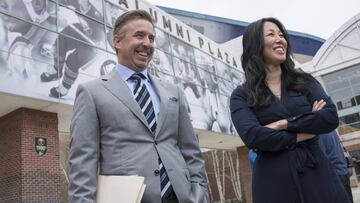 Russ Brandon and Kim Pegula chat with reporters following a press conference to announce that Pegula Sports Entertainment has purchased the former Hi-Temp Fabrication building and will develop the new Labatt USA headquarters which will include a pilot brewery, Wednesday, April 26, 2017. (Derek Gee/Buffalo News)