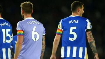 BRIGHTON, ENGLAND - NOVEMBER 27: Liam Cooper of Leeds United and Lewis Dunk of Brighton &amp; Hove Albion wear rainbow captains armbands as clubs show their support to the Stonewall Rainbow Laces campaign during the Premier League match between Brighton &