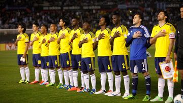 BUENOS AIRES, ARGENTINA - JUNE 07: Players of Colombia sing the national anthem before a match between Argentina and Colombia as part of the 13th round of the South American Qualifiers for the FIFA's World Cup Brazil 2014 at the Monumental Stadium on June 07, 2013 in Buenos Aires, Argentina. (Photo by Gabriel Rossi/LatinContent via Getty Images)