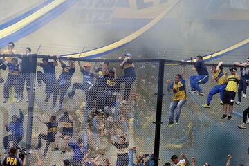 Boca Juniors supporters celebrate after their team defeats Union and wins Argentina's first division football championship at La Bombonera stadium in Buenos Aires, on June 25, 2017