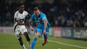 Jun 1, 2025; Mexico City, MEX; Vancouver Whitecaps FC midfielder Ali Ahmed (22) defends against Cruz Azul forward Rodolfo Rotondi (29) during the first half during the final of the Concacaf Champions Cup at Estadio Olímpico Universitario. Mandatory Credit: Kirby Lee-Imagn Images
