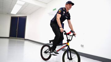 MILTON KEYNES, ENGLAND - NOVEMBER 30:  Max Verstappen of Netherlands and Red Bull Racing rides a bike around the factory during the Red Bull Racing Drivers Factory Visit at Red Bull Racing Factory on November 30, 2018 in Milton Keynes, England.  (Photo by Mark Thompson/Getty Images)