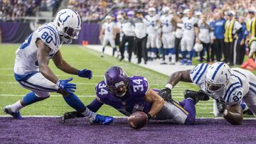 MINNEAPOLIS, MN - DECEMBER 18: Andrew Sendejo #34 of the Minnesota Vikings, Chester Rogers #80 and Dwayne Allen #83 of the Indianapolis Colts scramble for a loose ball after an incomplete pass during the first quarter of the game on December 18, 2016 at US Bank Stadium in Minneapolis, Minnesota.   Adam Bettcher/Getty Images/AFP
 == FOR NEWSPAPERS, INTERNET, TELCOS &amp; TELEVISION USE ONLY ==