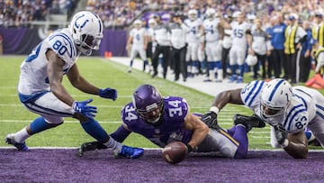 MINNEAPOLIS, MN - DECEMBER 18: Andrew Sendejo #34 of the Minnesota Vikings, Chester Rogers #80 and Dwayne Allen #83 of the Indianapolis Colts scramble for a loose ball after an incomplete pass during the first quarter of the game on December 18, 2016 at US Bank Stadium in Minneapolis, Minnesota.   Adam Bettcher/Getty Images/AFP
 == FOR NEWSPAPERS, INTERNET, TELCOS &amp; TELEVISION USE ONLY ==